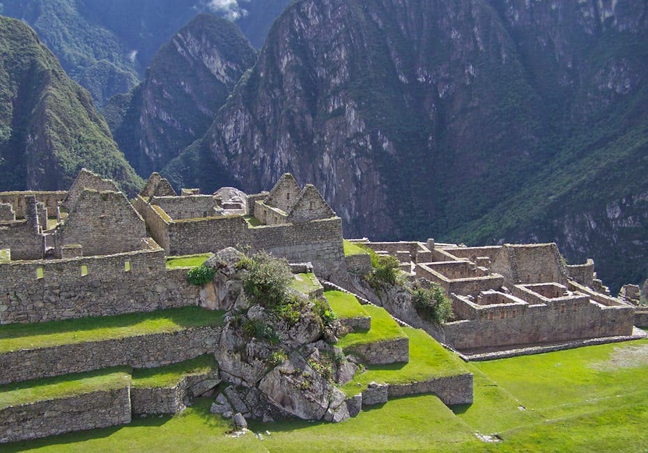 Breathtaking view of Machu Picchu ruins amidst lush mountains in Peru